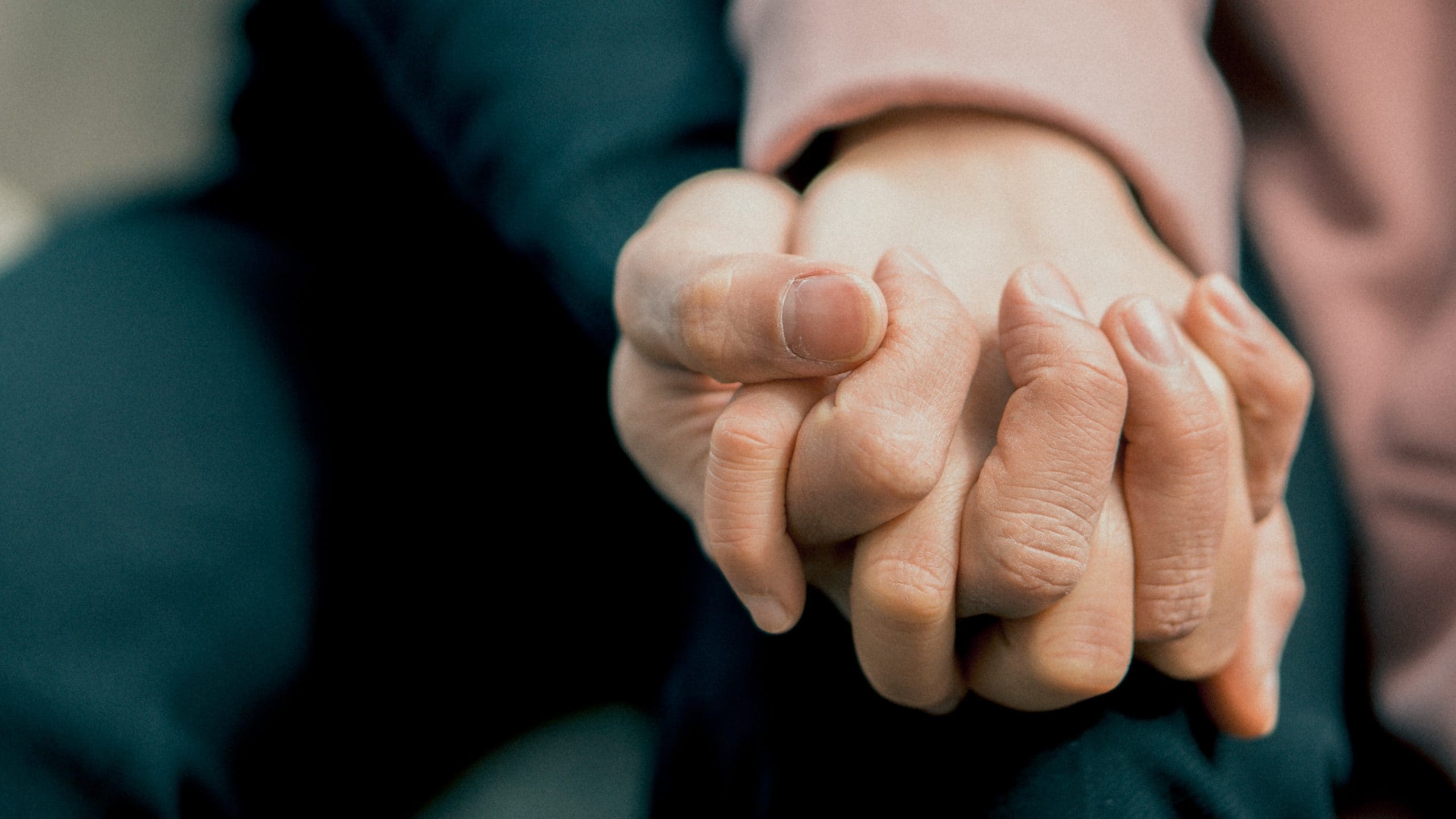 Supporting and Enabling, enabling Photo by Sơn Bờm: https://www.pexels.com/photo/photo-of-holding-hands-1773113/
